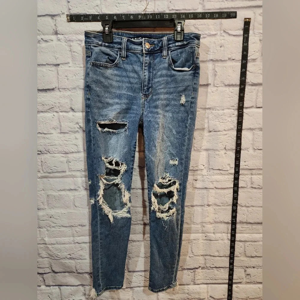 American Eagle jeggings with super high waist and ripped detail. Size 4